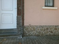 Repère géodésique de pied de façade