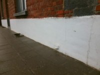 Repère géodésique de pied de façade
